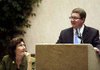 State Sen. Sue Madison, D-Fayetteville, listens as Michael Brown, legislative analyst with the state Bureau of Legislative Research, updates the status of federal stimulus money allocated to Arkansas on Wednesday at the Holiday Inn Northwest Arkansas in Springdale.