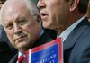Dick Cheney stands with then-President George W. Bush as Bush outlines national security strategy at the White House in July 2002, a time when Cheney's influence was near its peak.