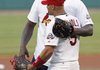 Cleveland Cavaliers center Shaquille O'Neal was in St. Louis to take on Cardinals first baseman Albert Pujols
(front) in a home run derby Thursday for O'Neal's reality show on ABC.