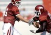 Arkansas quarterback Ryan Mallett (left) and running back Broderick Green practice in Fayetteville on Saturday.