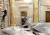 Randy Schaffer (left) and Karim Rasul work on renovating the House of Representatives chamber at the state Capitol.
