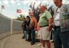 Veterans and their families prayed for those who served and those who are serving in the country's military forces during a commemoration of Victory in Japan Day at the Veterans Wall of Honor in Bella Vista on Saturday.