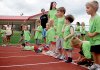 Ready, set ... no, not set quite yet. Children line up for a race around the Panther Stadium track at Cabot High School during the final meeting of the 2009 Cabot Family Track Night series.