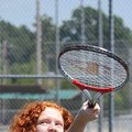 <b>Tennis time</b>
Caitlin Campbell, 8, of Bentonville hit tennis balls with her dad at Bentonville...