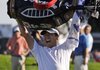 Y.E. Yang celebrates after upsetting Tiger Woods on Sunday to win the 91st PGA Championship at the Hazeltine National Golf Club in Chaska, Minn. It was Yang's first victory in a major and only his second on the PGA Tour.