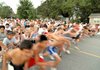 Runners left the finish line at South Fifth Street in Rogers on Monday night for the inaugural Rogers Heritage War Eagles Twilight Run to benefit the Heritage High School cross country teams. Close to 300 runners ran in the community event.