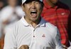 South Korean Y.E. Yang sank a birdie putt on the 72nd hole Sunday to seal his upset of Tiger Woods at the PGA Championship in Chaska, Minn.