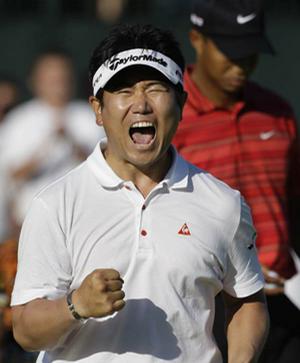 South Korean Y.E. Yang sank a birdie putt on the 72nd hole Sunday to seal his upset of Tiger Woods at the PGA Championship in Chaska, Minn.