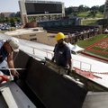 Scoreboard circuitry Chris Selfridge and Michael Loveland, both with Eastern Sign Technology in Burl...