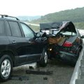 <b>Wet weather accident</b>
An Arkansas State Highway and Transportation Department worker walks pa...