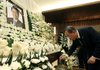 United Nations Secretary-General Ban Ki-Moon burns incense at a memorial room for late former South Korean President Kim Dae-Jung at a hospital in Seoul, South Korea, Tuesday.