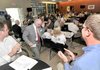 Dick Trammel, with Arvest Bank and the Arkansas Highway Commission, made his way up to speak at a luncheon for NWA Emerging Leaders at Arvest Ballpark in Springdale on Tuesday.