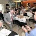 Dick Trammel, with Arvest Bank and the Arkansas Highway Commission, made his way up to speak at a lu...