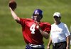 Former Green Bay Packers quarterback Brett Favre (4) throws passes at practice for the Minnesota Vikings on Tuesday in Eden Prairie, Minn.