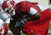 Arkansas receiver Greg Childs made a touchdown reception during Tuesday's practice when he waited for a defender to clear before catching a pass at the top of his shoes from quarterback Ryan Mallett.