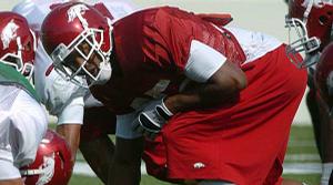 Arkansas receiver Greg Childs made a touchdown reception during Tuesday's practice when he waited for a defender to clear before catching a pass at the top of his shoes from quarterback Ryan Mallett.