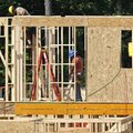 Workers frame a house in the Briar Chapel community near Chapel Hill, N.C., on Monday.