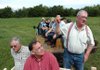 Herman Jones, a local farmer, right, tells U.S. Rep. John Boozman, center, and other visitors with the Washington County Farm Bureau and the Fayetteville Chamber of Commerce the history behind his farm - just on the Fayetteville city line near Lake Wilson - during Rural Friendship Day on Tuesday.