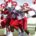 Arkansas sophomore linebacker Jerry Franklin (34) runs through punting drills during practice Tuesda...