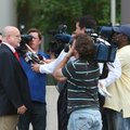John Wesley Hall (left), one of the attorneys representing Randeep Mann, speaks to the media outside...