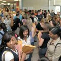 Sophomores, juniors and their parents filled the lobby of the North Building at Bentonville High Sch...