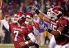 Arkansas kicker Alex Tejada (7) and tight end D.J. Williams (45) celebrate Tejada's extra-point kick that gave the Razorbacks a 31-30 victory over LSU last November. 