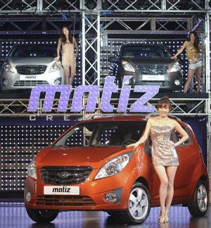 The GM Daewoo Auto & Technology Co.'s Spark minicar is unveiled Wednesday in Seoul, South Korea.