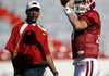 Quarterbacks coach Garrick McGee (left) coaches Arkansas quarterback Ryan Mallett during a summer practice. McGee was named Arkansas' offensive coordinator Monday.