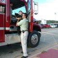 <b>Making an entrance</b>
Kindergartner Jesse Mansell, 5, gets a hand while exiting a West Fork fir...