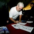 Kevin Welch, with the Southwest Missouri Development Alliance, filled out a nametag at a meeting con...