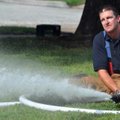 Bentonville firefighter Eddie Skerjanec participated in a hose drill for the Bentonville Fire Depart...