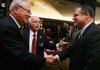 Arkansas Highway Commissioner Dick Trammel (center) introduces
Rudy Farber, vice chairman of the Missouri Department of Transportation
(left), to U.S. Sen. Mark Pryor, D-Ark., before a meeting about the
Bella Vista bypass project Thursday at the Bella Vista Country Club.