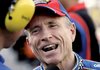 A happy Mark Martin is interviewed after finishing his qualifying laps for the NASCAR Sprint Cup Series Sharpie 500 auto race in Bristol, Tenn., on Friday.