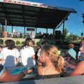 Kamryn Lawson, 10 left; Ciera Lawson, 3; and Bailey Reed, 10, with Cocoa, a teacup Chihuahua, reacte...