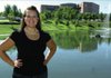 Rachel Mauldin, 26, stands in front of Washington Regional Medical Center, where she works, on Friday.  She won the Robert Ross Personal Achievement Award from the Muscular Dystrophy Association.  The award honors people who do a lot of community work to combat the disease.