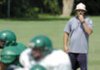 Greenland coach Tracy Sutton watches his players during practice Aug. 12 at the school's practice field in Greenland.