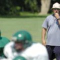 Greenland coach Tracy Sutton watches his players during practice Aug. 12 at the school's practice fi...
