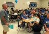 Rogers high School head football coach Ronnie Peacock made use of the whistle to get the attention of a room full of football mothers in Rogers on Saturday.