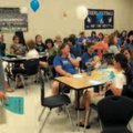 Rogers high School head football coach Ronnie Peacock made use of the whistle to get the attention o...