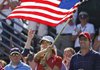 Paula Creamer (left) and Michelle Wie (right) celebrate after the United States defeated Europe in the Solheim Cup at Rich Harvest Farms in Sugar Grove, Ill., on Sunday. The U.S. team retained the Solheim Cup with a 16-12 victory.