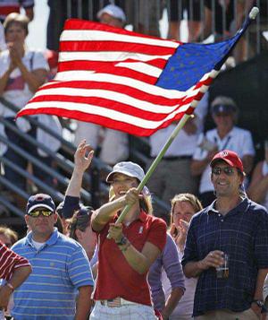 Paula Creamer (left) and Michelle Wie (right) celebrate after the United States defeated Europe in the Solheim Cup at Rich Harvest Farms in Sugar Grove, Ill., on Sunday. The U.S. team retained the Solheim Cup with a 16-12 victory.