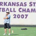 Fayetteville coach Daryl Patton watches during practice Aug. 14 at Harmon Field. The Bulldogs travel...