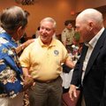 Retired Col. Don "Doc" Ballard, center, speaks with Bill Dorough of Little Rock, left, and Dwight Mi...