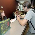 Alaina Stroud, left, at the Northwest Arkansas Community College Student Information Center in Bento...