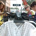 <b>Bargain hunters</b>
Kelly Brophy, left, Sara Tucker, center, and Shannon Hicks search through th...
