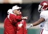 Arkansas assistant coach John L. Smith (left) was hired in the off-season to coordinate the Razorbacks' special teams, which were woeful at times last season. The 2008 season opener set the tone when the Razorbacks lost fumble on the opening kickoff.


