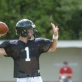 West Fork quarterback Isaac Muggy (1) passes during drills at practice Aug. 10 in West Fork.