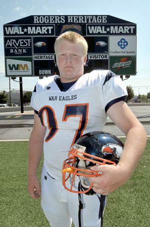 Rogers Heritage junior Reid Schatzman (6-3, 265) has grown an inch and added 25 pounds since his sophomore season with the War Eagles. Head coach Perry Escalante says his firstyear team 'got abused last year : plain and simple' against 7AWest opponents. Things could change this season for the War Eagles, who are bigger, stronger and more experienced. 