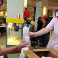 <b>Back to school at NWACC</b>
Mary Kate Taylor, 19, of Rogers handed Coy Rye, 17, of Bentonville a...