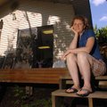 Cheryl Buell on the deck in front of her studio in Winslow.